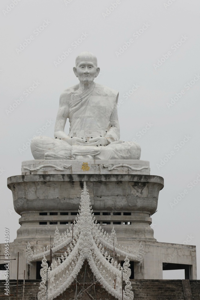 Wall mural statue of buddha in temple