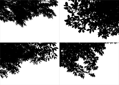 Set of realistic branches silhouettes in the corner