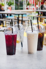 summer drinks in the plastic cups