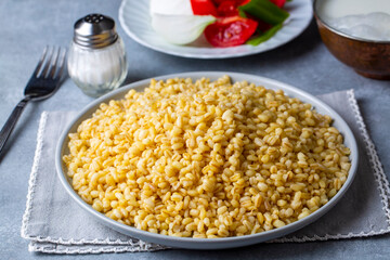 Dishes from traditional Turkish cuisine; head bulgur pilaf - whole bulgur wheat. Turkish name;...