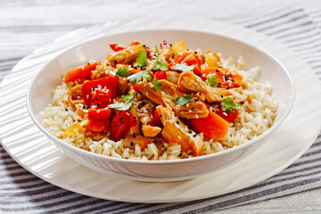 sweet and sour chicken with veggies and rice