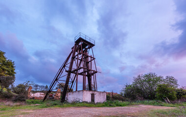 Fototapeta na wymiar Old and abandoned mining equipment in the deserted copper mine of Sao Domingos, Alentejo Portugal