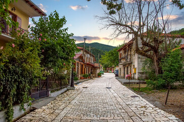 The main Street with traditional houses in Zarouchla village in Greece. Aroania mountain vilages, Peloponnese
