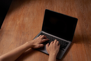 Business tecnology, e commerce concept. Man working on laptop computer