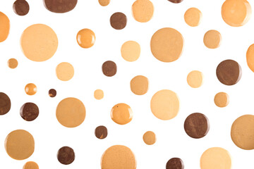 Diverse skin tone makeup foundation round drops background. Isolated, cut out.