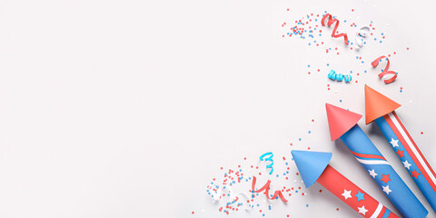 Obraz premium Firework rockets for USA Independence Day on light background with space for text