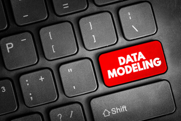 Data modeling - process of creating a data model for an information system by applying certain formal techniques, text concept button on keyboard