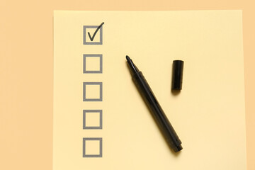 Checklist box with black marker, closeup