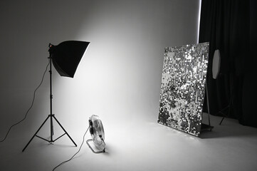 Studio with cyclorama and equipment. Interior of modern photostudio with ventilator professional...