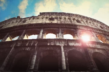 Fotobehang Oud gebouw Colosseum at sunset