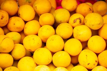 Mango close-up as a background. Tropical fruit mango bunch.