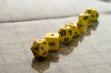 A set dices for dungeon and dragons game on checked flipmat