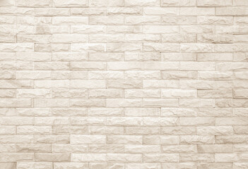 Cream and white brick wall texture background. Brickwork and stonework flooring interior rock old pattern design.