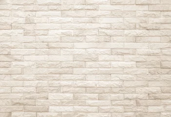 Tuinposter Cream and white brick wall texture background. Brickwork and stonework flooring interior rock old pattern design. © siripak