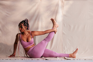 Athletic woman yoga stretching.