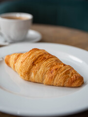 croissant and cup of coffee