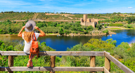 Woman tourist traveling in Portugal- Almourol castle