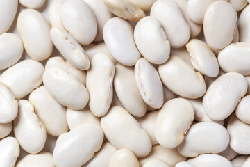 Pile of white beans closeup texture and background