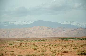 Desert landscapes in Morocco, desolate lands with paths that lead to remote and unexplored corners. Climate change and arid climate. Desertification and lack of water. Mountains and hills 