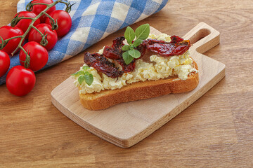 Bruschetta with soft cheese and tomato