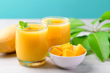 Fototapeta na wymiar Fresh mango smoothie in glass, Cold drink in summer season