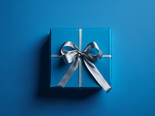 Blue gift box with silver bow on blue background. Top view. AI generated.