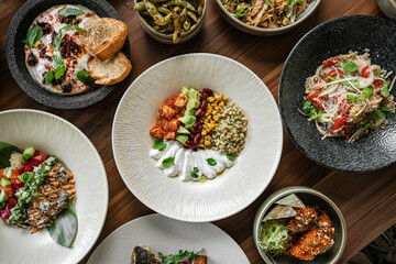 Superfoods, vegetables, fruits, seeds, legumes, nuts and grains for vegan and vegetarian eating. Clean eating. Detox, dieting food concept. Top view . dinner