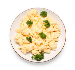 Plate of delicious scrambled eggs isolated on white background