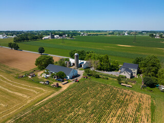 Aerial View of Farm Surrounded by Fields