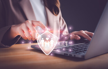 Businesswoman with cutout paper of family. protecting family, insurance, life, health, domestic violence, world mental health day, international day of families, family day, family care concept.