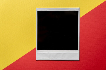 Download Blank photo frame template on red and yellow background. Blank square photo frame on wall copy space