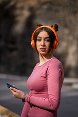 Women Exercising with a Smartphone and headphones