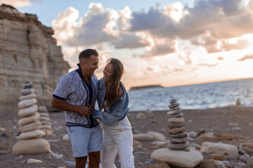couple enjoying the company of each other at beach