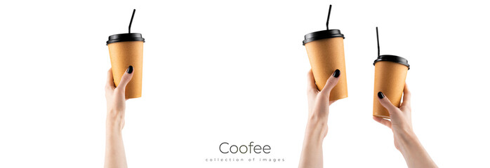 Woman holding black paper cup of hot coffee with white background. Female hand with black nails.