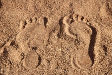 Fototapeta na wymiar Footprints in desert sand