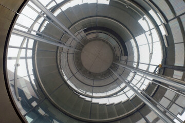 Uprisen view of spiral staircase, look like an eye of giant machine