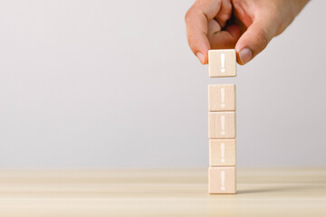 wooden blocks with exclamation marks arranged or arranged	
