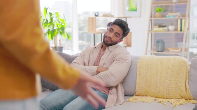 Angry man listening to woman in fight, problem and drama of divorce, conflict and emotions at home. Frustrated partner, couple and argument in toxic relationship, cheating and bad breakup in lounge