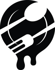 spoon and fork in a pan