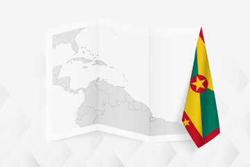 A grayscale map of Grenada with a hanging Grenadian flag on one side. Vector map for many types of news.
