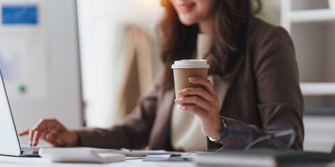 Accountant woman working on laptop and do document, tax, exchange, research, accounting and Financial advisor concept