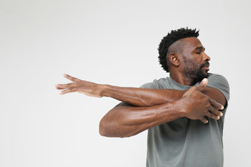 African American athletic man with doing biceps stretching exercises. Mock-up.