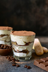 Tiramisu - italian dessert with mascarpone , biscuit and coffee.