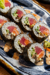 Sushi roll with salmon and tuna