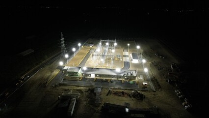 Aerial shot of Electrical Substation in the night 