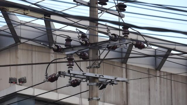 Electric cable network with a sky background