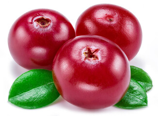 Ripe red cranberries with green leaves on white background. Close-up.