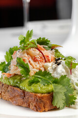 Bruschetta with poached egg and crab meat