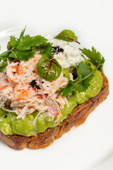 Bruschetta with poached egg and crab meat