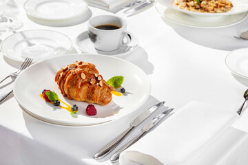 French croissant with caramel and hazelnut on top